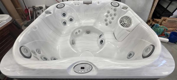 Détendez-vous dans le luxe : Spa Jacuzzi J-345 (2013) – Occasion Impeccable